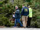 Last week, FBI investigators and a Watertown, Mass., police officer investigate the scene near the boat where bombing suspect Dzhokhar Tsarnaev was hiding. Democrats have argued that the way the government responded to the Boston attacks makes a case for not cutting too deeply. Last week, FBI investigators and a Watertown, Mass., police officer investigate the scene near the boat where bombing suspect Dzhokhar Tsarnaev was hiding. Democrats have argued that the way the government responded to the Boston attacks makes a case for not cutting too deeply.
