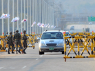 South Korean soldiers stand beside barricades as cars drive on the road leading to North Korea's Kaesong industrial complex on Friday. South Korean soldiers stand beside barricades as cars drive on the road leading to North Korea's Kaesong industrial complex on Friday.