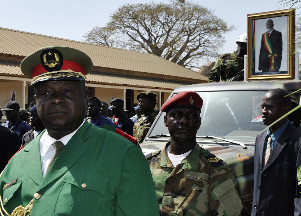 Gen. Antonio Indjai (left), Guinea-Bissau's army chief of staff, at the funeral of the country's late president, Malam Bacai Sanha, on Jan. 15, 2012. The U.S. says Indjai has been involved in drug trafficking, an allegation he denies. He recently eluded a U.S. sting operation that led to the capture of other officials from his country.