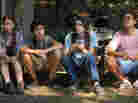 A ragtag group of amateur birders pursue a rare North American duck in A Birder's Guide to Everything. Pictured (from left): Katie Chang, Alex Wolff, Kodi Smit-McPhee and Michael Chen.