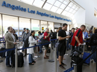 Travelers stand in line at Los Angeles International Airport on Monday. Congress moved quickly this week to give the Federal Aviation Administration flexibility to end air traffic controller furloughs that resulted in flight delays at several airports. Travelers stand in line at Los Angeles International Airport on Monday. Congress moved quickly this week to give the Federal Aviation Administration flexibility to end air traffic controller furloughs that resulted in flight delays at several airports.