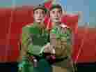 A Chinese and a North Korean embrace in a pledge of everlasting (political) love. From Raid on the White Tiger Regiment, 1971. A Chinese and a North Korean embrace in a pledge of everlasting (political) love. From Raid on the White Tiger Regiment, 1971.
