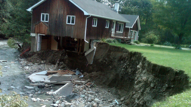 A house destroyed by Tropical Storm Irene sits in Rochester, Vt., in 2011. (AP)