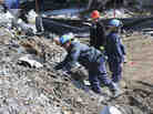 ATF agents search last week for evidence at the site of the fire and explosion in West, Texas.
