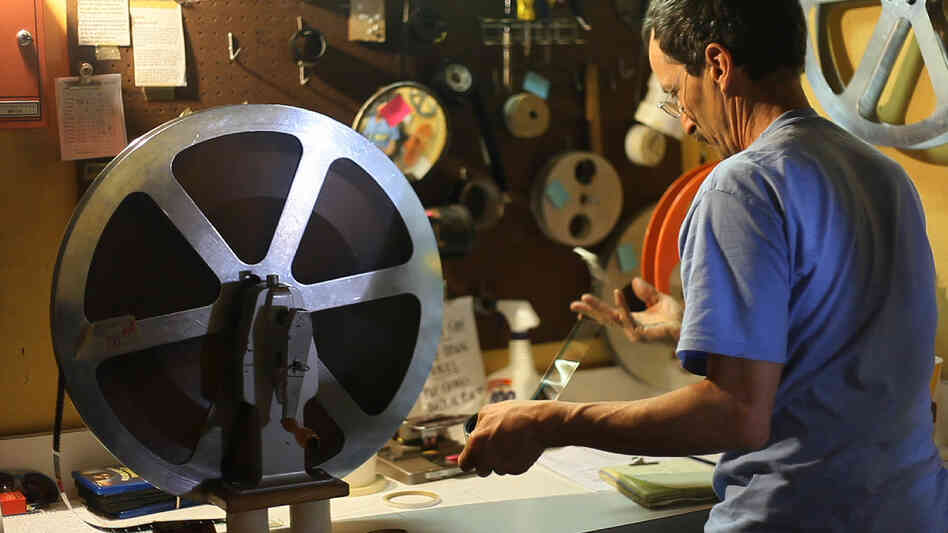 After Tuesday, projectionist Andy Holyoke will help retire the Little Art Theatre's vintage Italian reel-to-reel projectors. After Tuesday, projectionist Andy Holyoke will help retire the Little Art Theatre's vintage Italian reel-to-reel projectors.