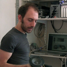 Composer Tristan Perich in his home and workspace. Composer Tristan Perich in his home and workspace.