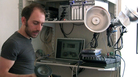 Composer Tristan Perich in his home and workspace. Composer Tristan Perich in his home and workspace.