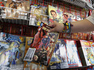 Mary Ann Shilts takes one of the give away comic books from the display rack at the New Dimensions Comics store in Cranberry, Pa., Butler County, as part of Free Comic Book Day 2012. Free Comic Book Day 2013 is Saturday, May 4. Mary Ann Shilts takes one of the give away comic books from the display rack at the New Dimensions Comics store in Cranberry, Pa., Butler County, as part of Free Comic Book Day 2012. Free Comic Book Day 2013 is Saturday, May 4.