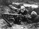 Soldiers with the British Machine Gun Corps wear gas masks in 1916 during World War I's first Battle of the Somme. Soldiers with the British Machine Gun Corps wear gas masks in 1916 during World War I's first Battle of the Somme.