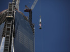 The 408-foot spire was hoisted onto a temporary platform at the top of One World Trade Center on Thursday. The 408-foot spire was hoisted onto a temporary platform at the top of One World Trade Center on Thursday.