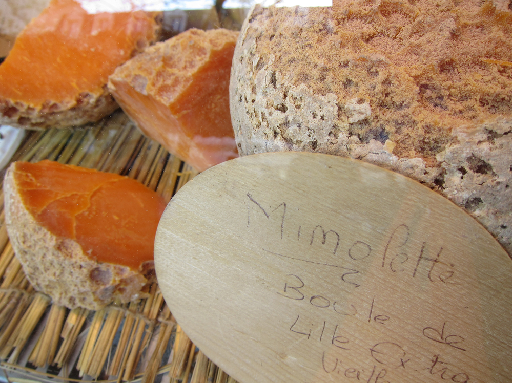 Microscopic bugs called cheese mites are responsible for giving Mimolette its distinctive rind and flavor.