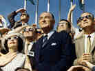 Vice President Spiro Agnew (right) and former President Lyndon Johnson view the liftoff of Apollo 11 from the stands at the Kennedy Space Center on July 16, 1969.