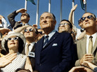 Vice President Spiro Agnew (right) and former President Lyndon Johnson view the liftoff of Apollo 11 from the stands at the Kennedy Space Center on July 16, 1969.