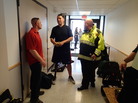 Marine Sgt. Maj. Damion Jacobs (left) and Marine Capt. Cam West visit with Boston emergency workers who responded to the bombings at the Boston Marathon. Marine Sgt. Maj. Damion Jacobs (left) and Marine Capt. Cam West visit with Boston emergency workers who responded to the bombings at the Boston Marathon.