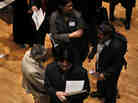 Looking for work: The scene at a job fair in New York City earlier this year. Figures on job growth and unemployment in April are due Friday morning.