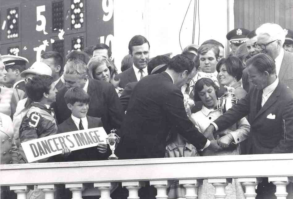 Stephen Johnstone and his friend, Sharron Reynolds, snuck into Derby celebrations in 1968. Reynolds is just behind the woman with the trophy; Johnstone is to Reynolds' right. Stephen Johnstone and his friend, Sharron Reynolds, snuck into Derby celebrations in 1968. Reynolds is just behind the woman with the trophy; Johnstone is to Reynolds' right.