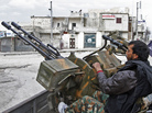 Free Syrian Army fighters sit behind an anti-aircraft weapon in Aleppo, Syria, in February. The rebels say U.S.-provided weapons would help in their fight against Bashar Assad's regime. Free Syrian Army fighters sit behind an anti-aircraft weapon in Aleppo, Syria, in February. The rebels say U.S.-provided weapons would help in their fight against Bashar Assad's regime.