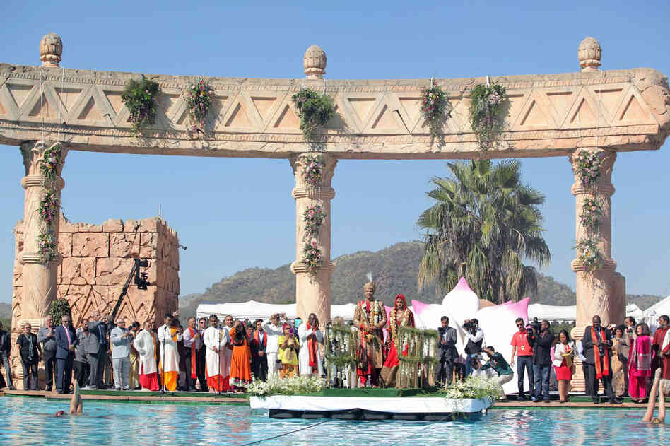 The wedding party poses at the Sun City resort in South Africa, on Wednesday. South Africa's government announced the suspension of a slew of officials and military personnel on Friday as it tried to limit the political and diplomatic fallout from the lavish Indian wedding. The wedding party poses at the Sun City resort in South Africa, on Wednesday. South Africa's government announced the suspension of a slew of officials and military personnel on Friday as it tried to limit the political and diplomatic fallout from the lavish Indian wedding.