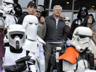 Fans are celebrating Star Wars Day today, May 4. Here, actor David Prowse (center), who played Darth Vader in the first Star Wars trilogy, poses with costumed fans in France last week. Fans are celebrating Star Wars Day today, May 4. Here, actor David Prowse (center), who played Darth Vader in the first Star Wars trilogy, poses with costumed fans in France last week.