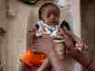 A health worker weighs a Somali baby on scales at a medical clinic in Mogadishu. Babies in Somalia have the highest risk of dying within the first 24 hours after birth. A health worker weighs a Somali baby on scales at a medical clinic in Mogadishu. Babies in Somalia have the highest risk of dying within the first 24 hours after birth.