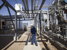Deward Cawthon, a plant operator at the Federal Helium Reserve, walks through the Federal Crude Helium Enrichment Unit near Amarillo, Texas, in 2011. Deward Cawthon, a plant operator at the Federal Helium Reserve, walks through the Federal Crude Helium Enrichment Unit near Amarillo, Texas, in 2011.