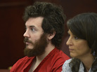 James Holmes, left, and defense attorney Tamara Brady appear in district court in Centennial, Colo. for his arraignment. James Holmes, left, and defense attorney Tamara Brady appear in district court in Centennial, Colo. for his arraignment.