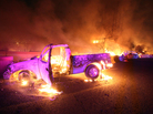 Burned cars sit on a highway in Ecatepec near Mexico City, where a gas tanker truck exploded Tuesday. The explosion caused at least 20 deaths and widespread damage in the area. Burned cars sit on a highway in Ecatepec near Mexico City, where a gas tanker truck exploded Tuesday. The explosion caused at least 20 deaths and widespread damage in the area.