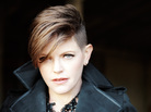 Natalie Maines, former singer for the Dixie Chicks, placed the group at the center of controversy in 2003, when she publicly criticized George W. Bush's decision to invade Iraq. Natalie Maines, former singer for the Dixie Chicks, placed the group at the center of controversy in 2003, when she publicly criticized George W. Bush's decision to invade Iraq.