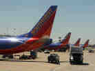Southwest airline jets are lined up at Long Island MacArthur Islip airport in 2010. Departures at the New York City suburban airport dropped nearly 50 percent between 2007 and 2012, according to an MIT study.