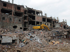 Bangladeshi rescue and army personnel on Wednesday continue recovery operations at the site of the building collapse near Dhaka. Bangladeshi rescue and army personnel on Wednesday continue recovery operations at the site of the building collapse near Dhaka.