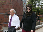 Katherine Russell leaves the law office of DeLuca and Weizenbaum with Amato DeLuca, last month. Katherine Russell leaves the law office of DeLuca and Weizenbaum with Amato DeLuca, last month.