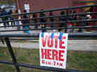 Voters wait in line to cast their ballots at Cleveland Avenue Baptist Church in Kansas City, Mo., on Nov. 6, 2012. Voters wait in line to cast their ballots at Cleveland Avenue Baptist Church in Kansas City, Mo., on Nov. 6, 2012.