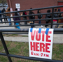 Voters wait in line to cast their ballots at Cleveland Avenue Baptist Church in Kansas City, Mo., on Nov. 6, 2012.