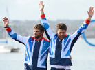 Andrew 'Bart' Simpson stands to the left of fellow sailor Iain Percy at the London 2012 Olympic Games. Andrew 'Bart' Simpson stands to the left of fellow sailor Iain Percy at the London 2012 Olympic Games.