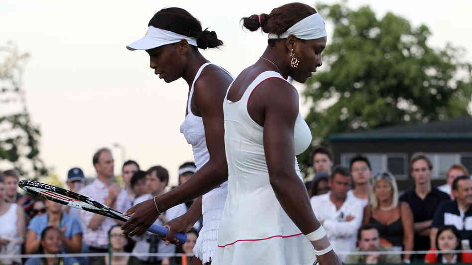 Serena Williams (left) and her sister Venus Williams in action during their first-round doubles match on Day 2 at Wimbledon in 2010. Serena Williams (left) and her sister Venus Williams in action during their first-round doubles match on Day 2 at Wimbledon in 2010.