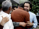 Musa Gilani (right) is comforted on Thursday after his brother, Ali Haider Gilani, was kidnapped at an election rally. Musa Gilani (right) is comforted on Thursday after his brother, Ali Haider Gilani, was kidnapped at an election rally.