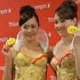 Models from Triumph International display the new "Branomics Bra" on Wednesday in Tokyo.