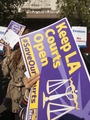 Members of the Save Our Courts coalition rally outside the Los Angeles County Courthouse in March. The county will soon cut the number of courthouses handling small claims cases from 27 to six.