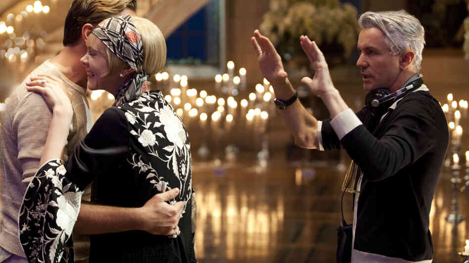 Light It Up: Director Baz Luhrmann (right, with stars Leonardo DiCaprio and Carey Mulligan on the set of The Great Gatsby) brought a lush visual sensibility to a tale whose tone not everyone thinks of as epic. Light It Up: Director Baz Luhrmann (right, with stars Leonardo DiCaprio and Carey Mulligan on the set of The Great Gatsby) brought a lush visual sensibility to a tale whose tone not everyone thinks of as epic.