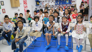 The children of wealthy Chinese attend classes designed to teach them how to do things like raise money for charity. The parents pay up to $10,000 a year to send their kids to weekend classes. The children of wealthy Chinese attend classes designed to teach them how to do things like raise money for charity. The parents pay up to $10,000 a year to send their kids to weekend classes.