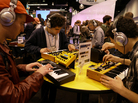 Attendees at the 2012 show of the National Association of Music Merchants. MIDI was first demonstrated at the NAMM show in 1983; today, it's built into most of the gear at the show. Attendees at the 2012 show of the National Association of Music Merchants. MIDI was first demonstrated at the NAMM show in 1983; today, it's built into most of the gear at the show.