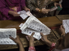 Election workers count ballots at a polling station in Lahore, Pakistan, on Saturday. The election marks the first time in the country's history that an elected government will hand over power to another elected government. Election workers count ballots at a polling station in Lahore, Pakistan, on Saturday. The election marks the first time in the country's history that an elected government will hand over power to another elected government.