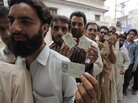 Pakistani men lined up to vote in Rawalpindi on Saturday. Men and women cast ballots separately as millions went to the poll. Pakistani men lined up to vote in Rawalpindi on Saturday. Men and women cast ballots separately as millions went to the poll.