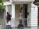 Workers board up the house where three women were held in Cleveland Saturday. Suspect Ariel Castro, who allegedly held three women captive for nearly a decade, is charged with rape and kidnapping. Sunday, the women asked for privacy and time to connect with their families. Workers board up the house where three women were held in Cleveland Saturday. Suspect Ariel Castro, who allegedly held three women captive for nearly a decade, is charged with rape and kidnapping. Sunday, the women asked for privacy and time to connect with their families.