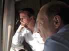 British Prime Minister David Cameron (left) and Russian President Vladimir Putin viewed the Sochi Olympic Park along the Black Sea coast by helicopter Friday. British Prime Minister David Cameron (left) and Russian President Vladimir Putin viewed the Sochi Olympic Park along the Black Sea coast by helicopter Friday.
