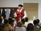 Eric Wilson, head of the Kentucky 9/12 Project, portrays a representative of the tyrannical kingdom as he talks to children on the first night of Vacation Liberty School at a church in Georgetown, Ky., in 2010.