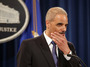 Attorney General Eric Holder says he recused himself last year from a national security leak probe in which prosecutors obtained the phone records of Associated Press journalists.