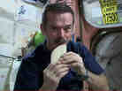 Cmdr. Chris Hadfield demonstrates how to make a sandwich, space station-style.