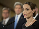 Actress Angelina Jolie at a news conference with Secretary of State John Kerry (in background) and other foreign ministers in London last month. They held a forum on how to reduce sexual violence against women in conflict zones — an issue she has often spoken about. Actress Angelina Jolie at a news conference with Secretary of State John Kerry (in background) and other foreign ministers in London last month. They held a forum on how to reduce sexual violence against women in conflict zones — an issue she has often spoken about.