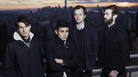 Vampire Weekend's third album is titled Modern Vampires of the City. Singer Ezra Koenig (far left) says he sees it as the closing chapter of a trilogy. Vampire Weekend's third album is titled Modern Vampires of the City. Singer Ezra Koenig (far left) says he sees it as the closing chapter of a trilogy.